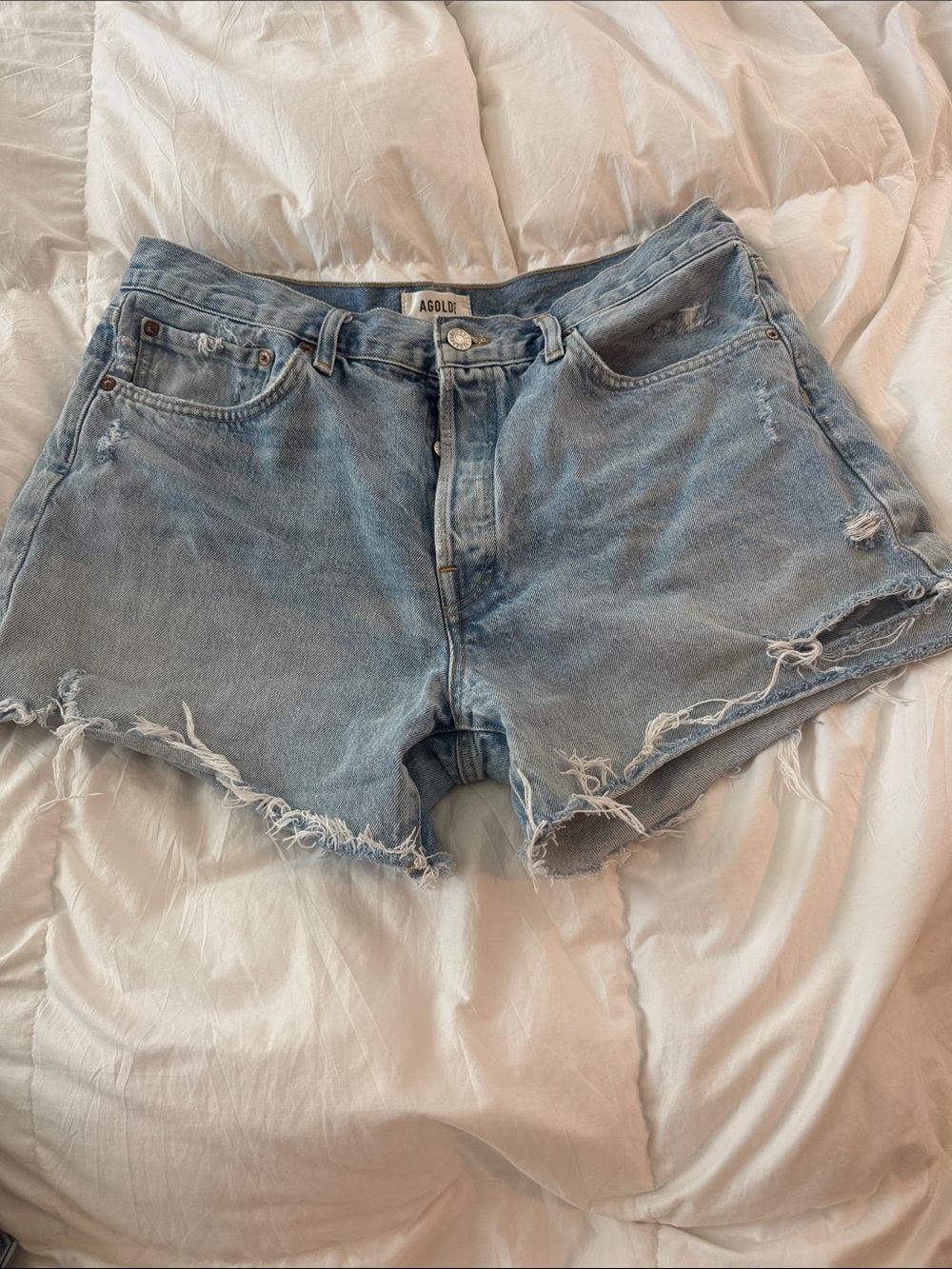 Agolde Light Wash Distressed Denim Cutoff Shorts